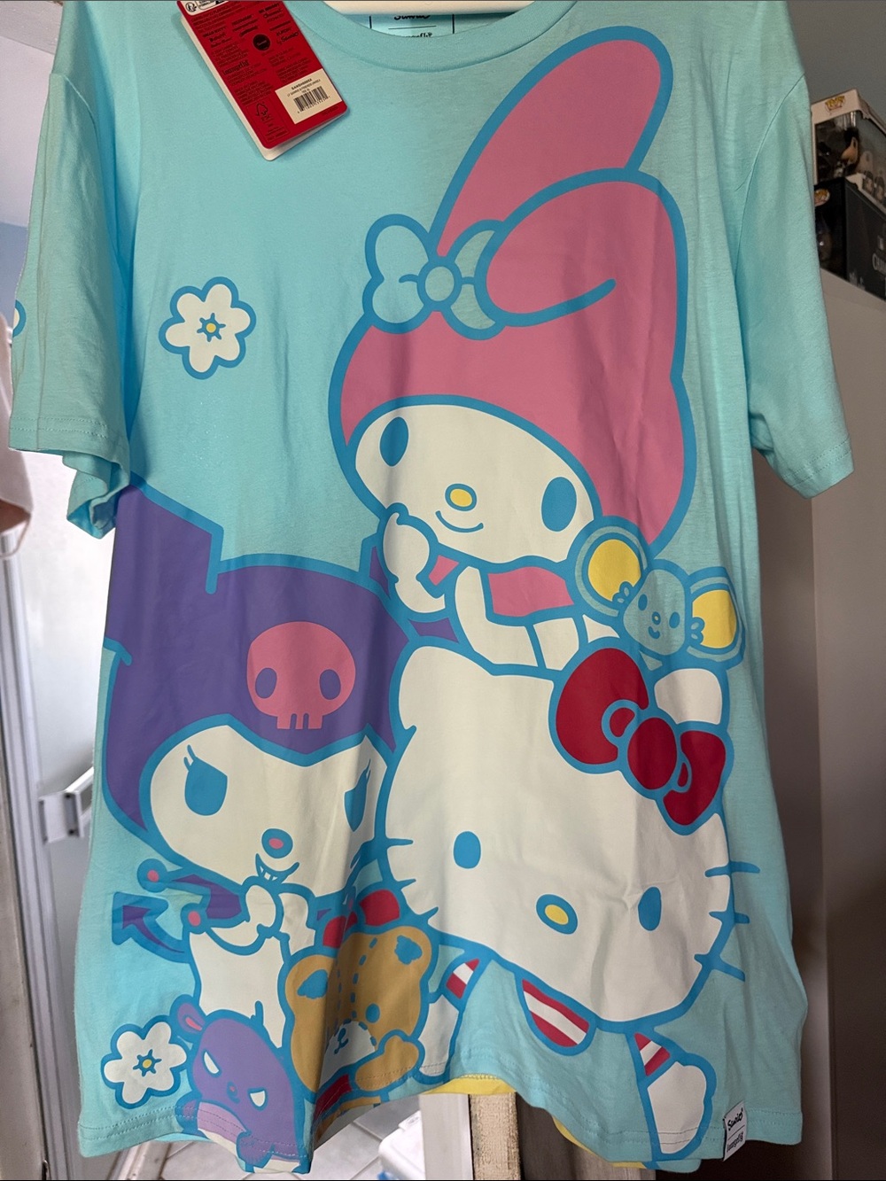 Loungefly Light Blue Short Sleeve Tee with Pink, Purple & Red Character Print